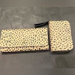 2 matching Leopard / Cheetah print wallets. Like New condition